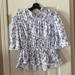 White and blue floral top:: high neck, cinched waist, peplum, 3/4 length sleeve